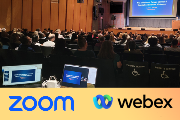 Auditorium with Hybrid Meeting Host equipment at the back. Zoom and Webex logos.